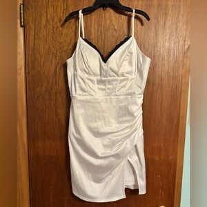 Elegant White Satin Dress with Black Lace Trim